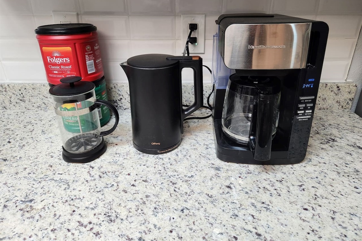 Coffee station: coffee, coffee maker, French press coffee, water kettle