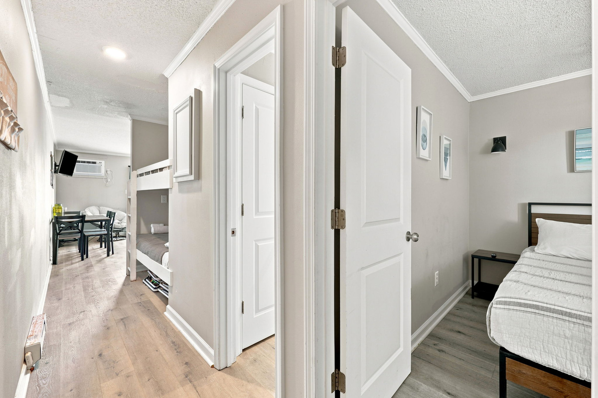 Conveniently located sleeping spaces provide privacy while keeping everyone close to the shared living areas