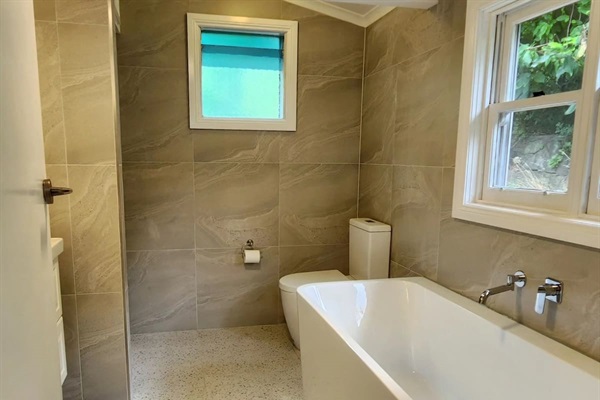 There are 2 new bathrooms and 2 toilets. One has a shower, and the other a massive bath. All body washes, haircare and even bubble bath are supplied. Also washer/dryer, iron, hair-dryer etc.