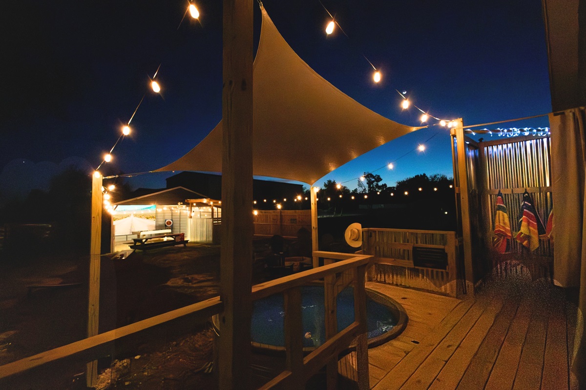 Private cowboy pool under the lights — soak, cool off, and unwind day or night