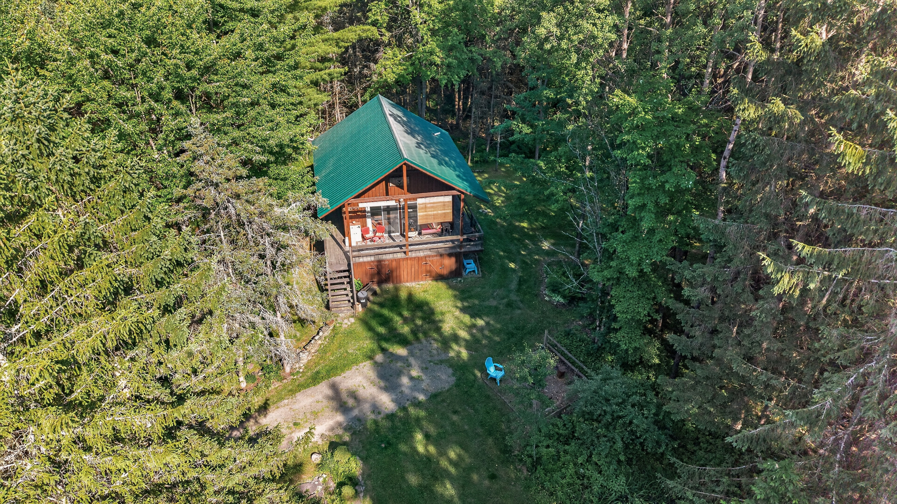 Aerial view of the wooded property