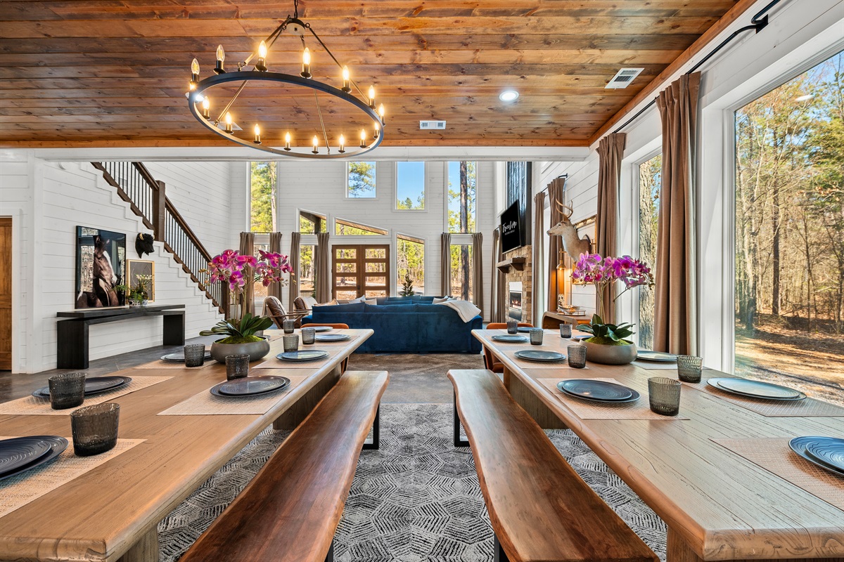 The spacious dining area is set for memorable meals, with a stylish setup that makes every dinner feel special.