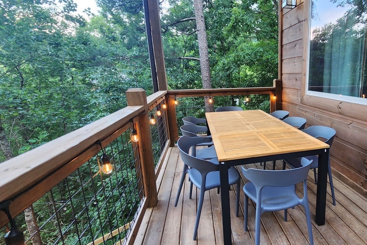 Dining table on deck with views