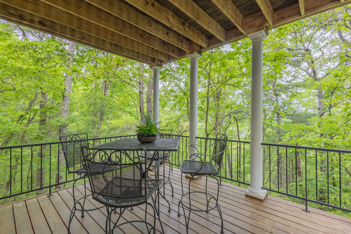 This private outdoor seating area offers the perfect spot for morning coffee, quiet conversations, or unwinding after a day of exploring.