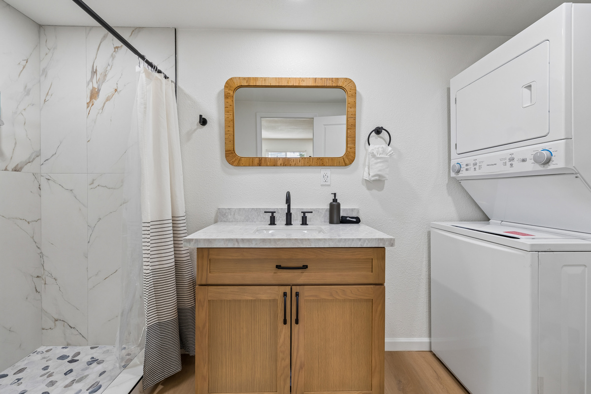 Free washer and dryer located in the on-suite bathroom