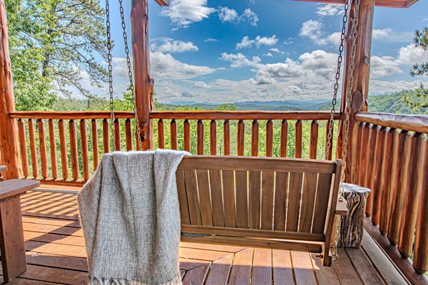 Capture every sunrise from the porch swing that is situated perfectly to enjoy the Mountain View