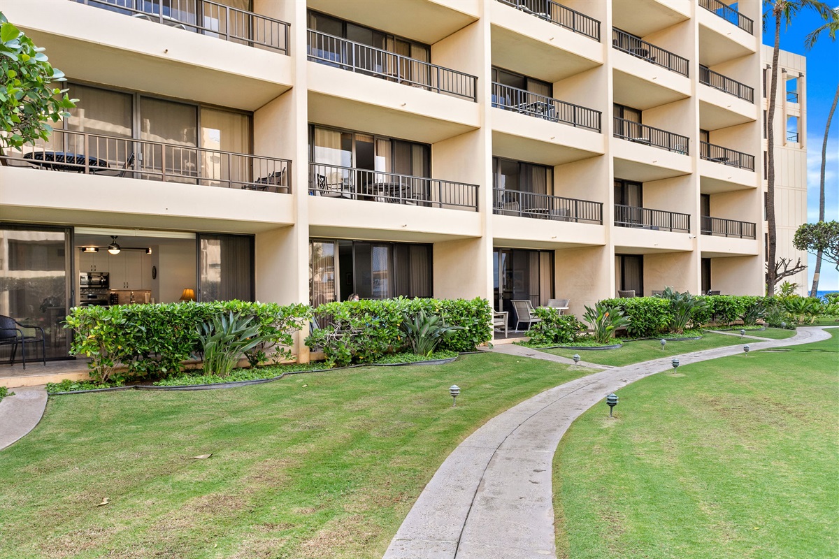 Looking into the condo from the lawn (bottom left). The path leads to the  pool and beach