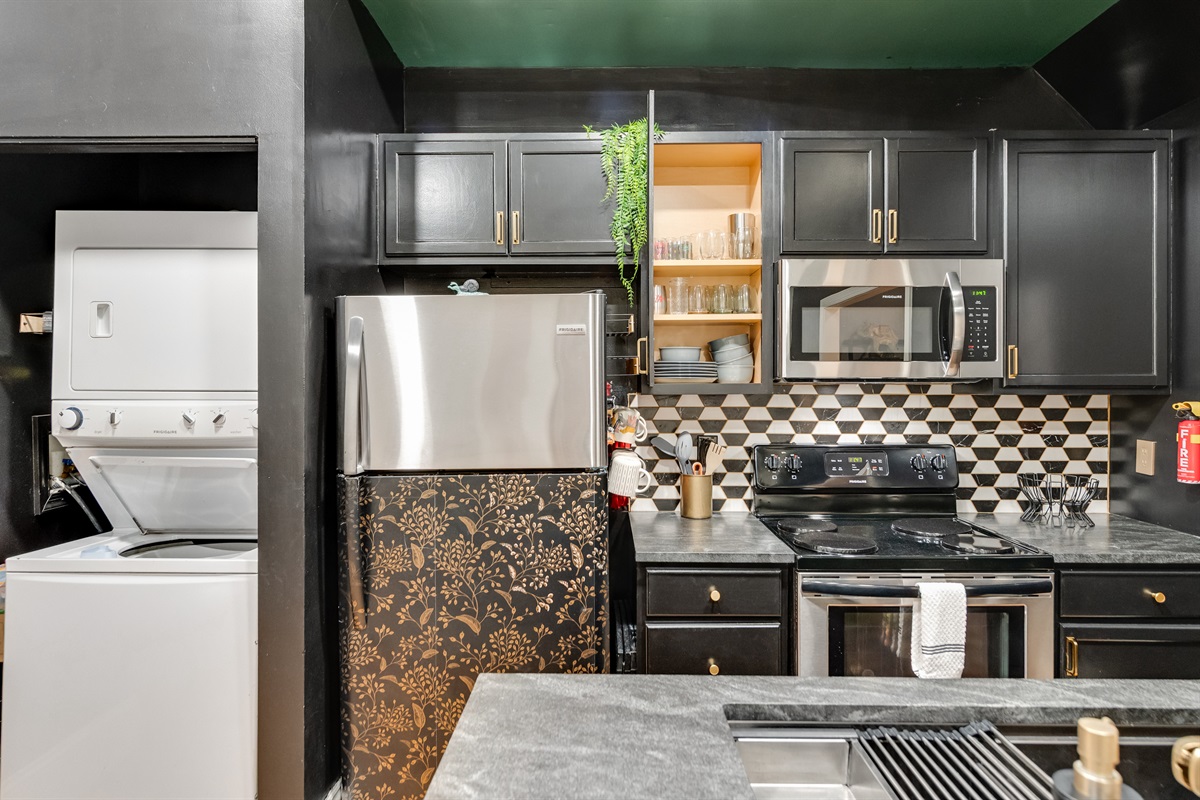 Stylish Kitchen: Gourmet finishes, modern appliances, and quirky decor await your culinary adventures!