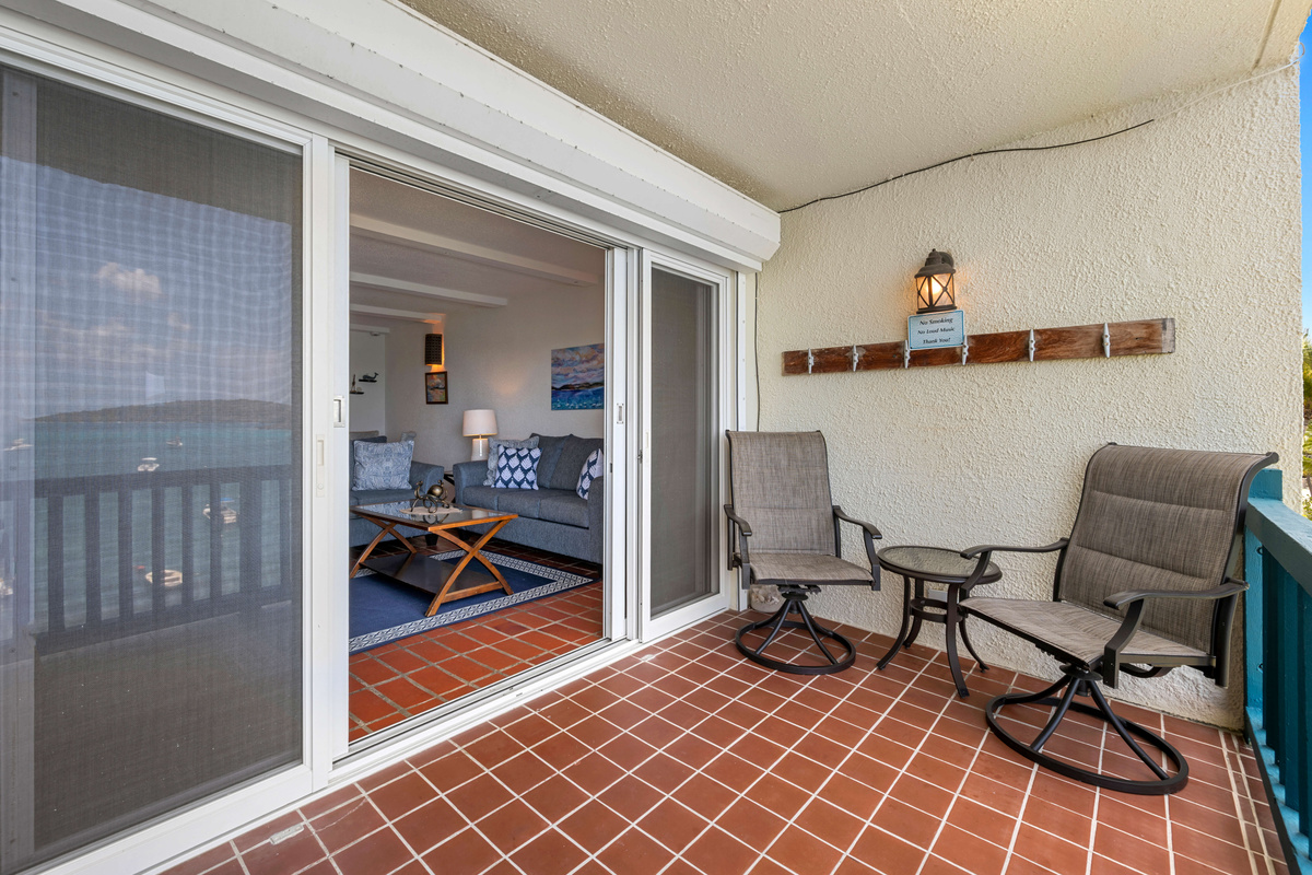 Front-row seats to paradise with panoramic views of the beach and turquoise water.