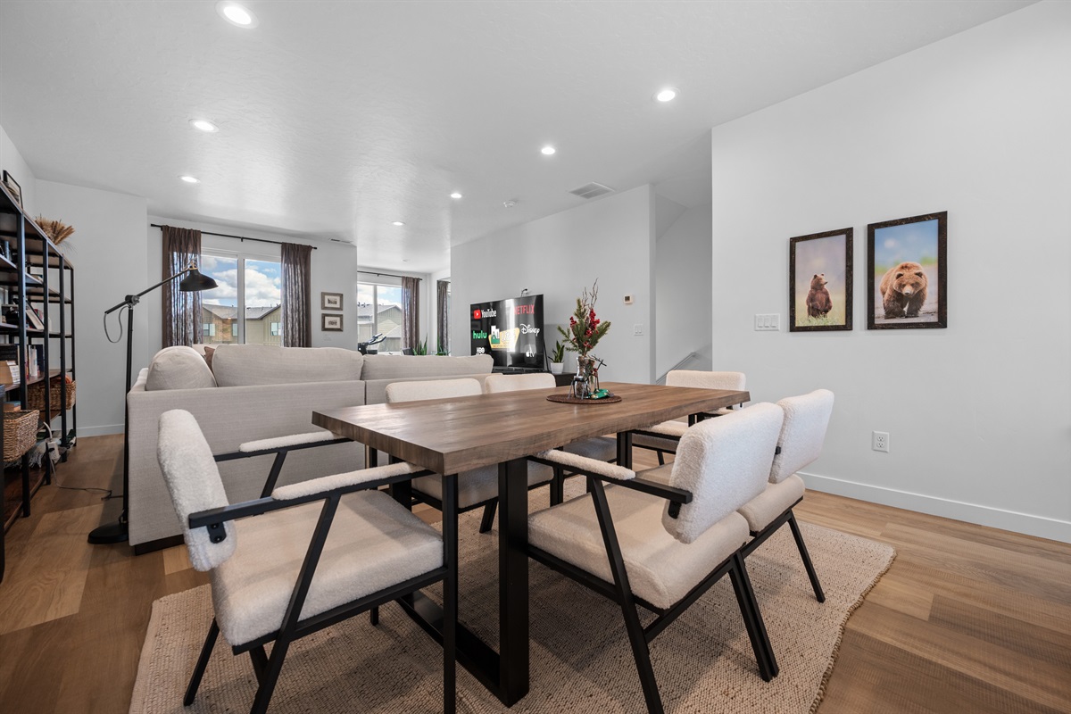 Open dining area with modern furnishings and warm ambiance.