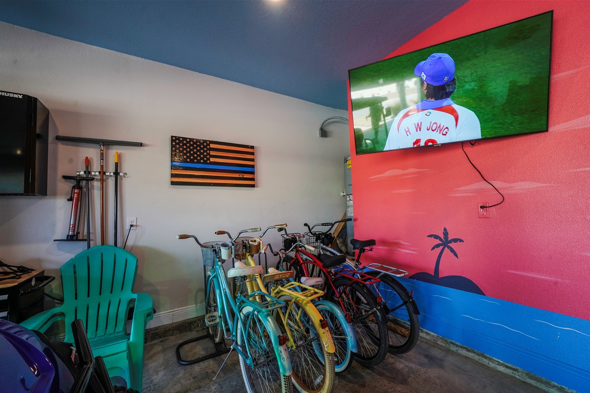 Enjoy the garage with a TV, arcade games, and plenty of seating for friends and family.