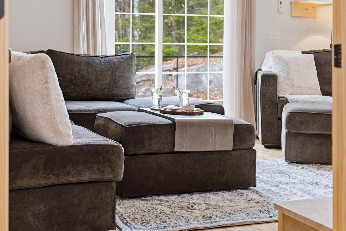 After a day on the slopes, melt into our plush oversized sofa, comfort designed for the whole family to gather.