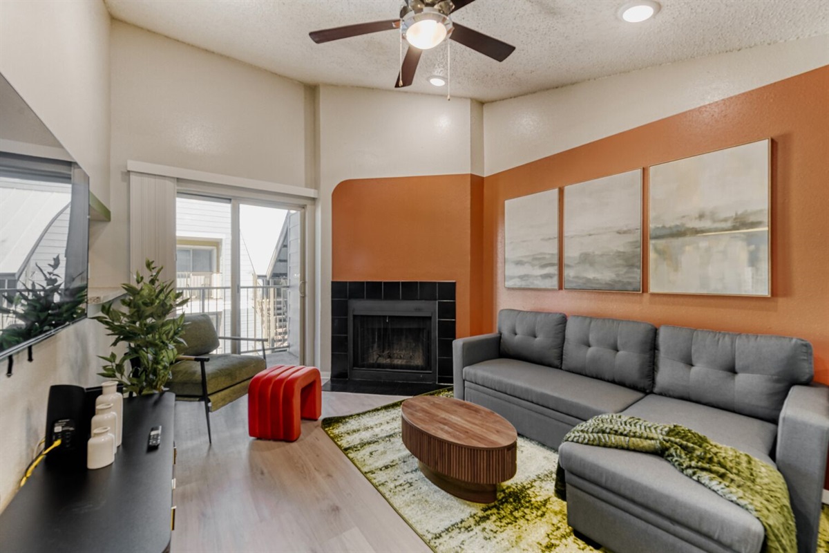 Warm tones and modern comfort come together — a stylish living space designed for relaxation and connection.