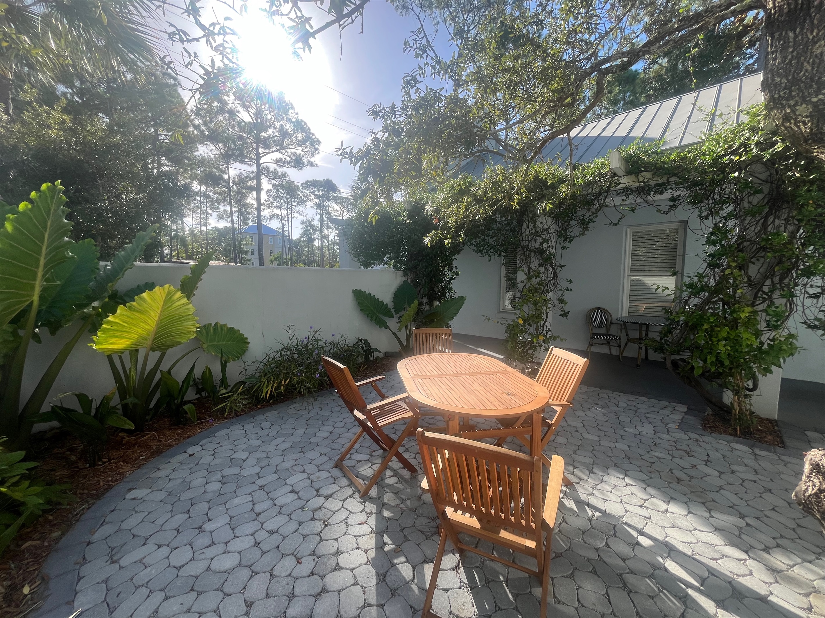 An ideal place to enjoy early morning coffee or late night cocktail, just steps from the kitchen.