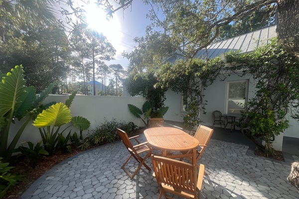 An ideal place to enjoy early morning coffee or late night cocktail, just steps from the kitchen.