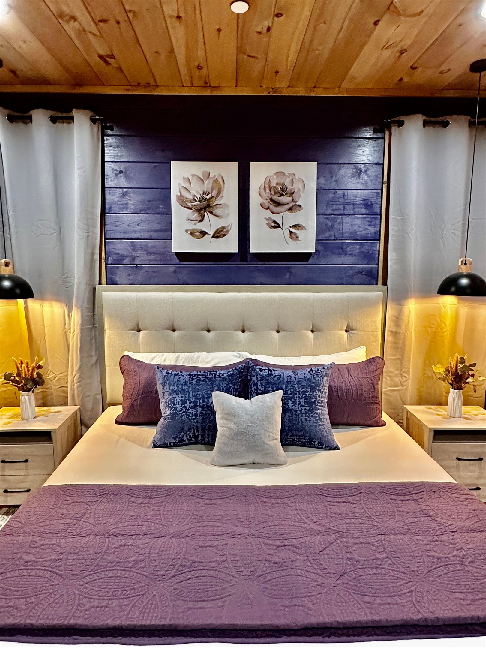 Soft layers, warm lighting, and thoughtful details create a cozy king retreat made for unwinding. Tucked in with plush pillows and calming tones, this space invites slow nights and easy mornings in the mountains.