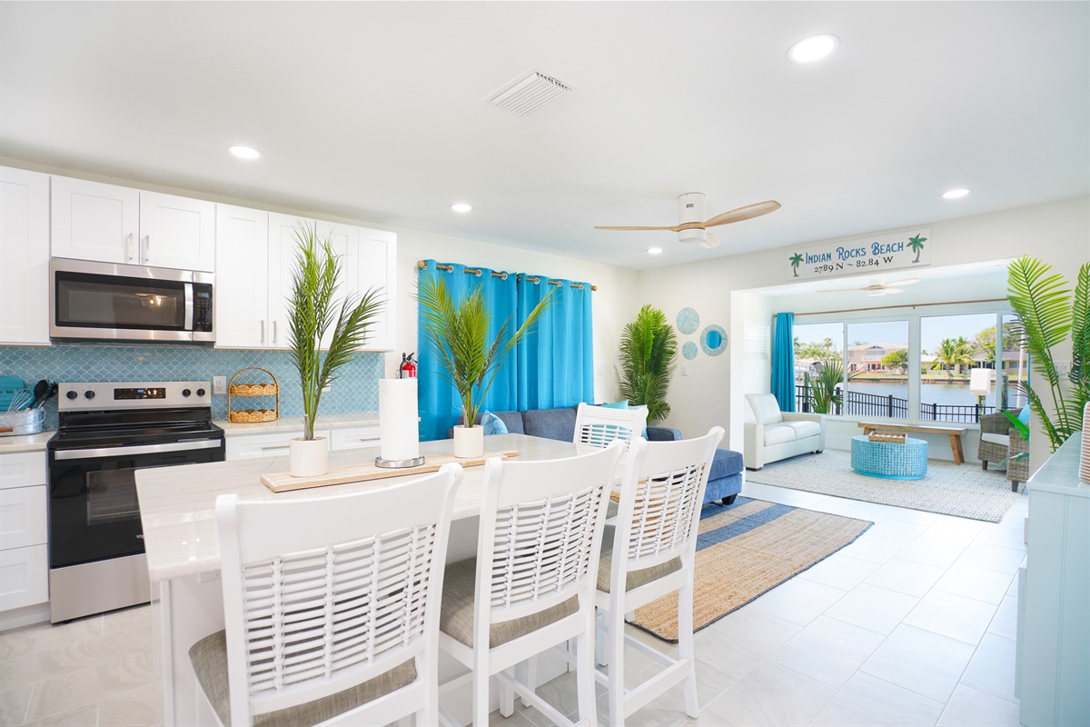 The kitchen island's seating lets the cook enjoy company.
