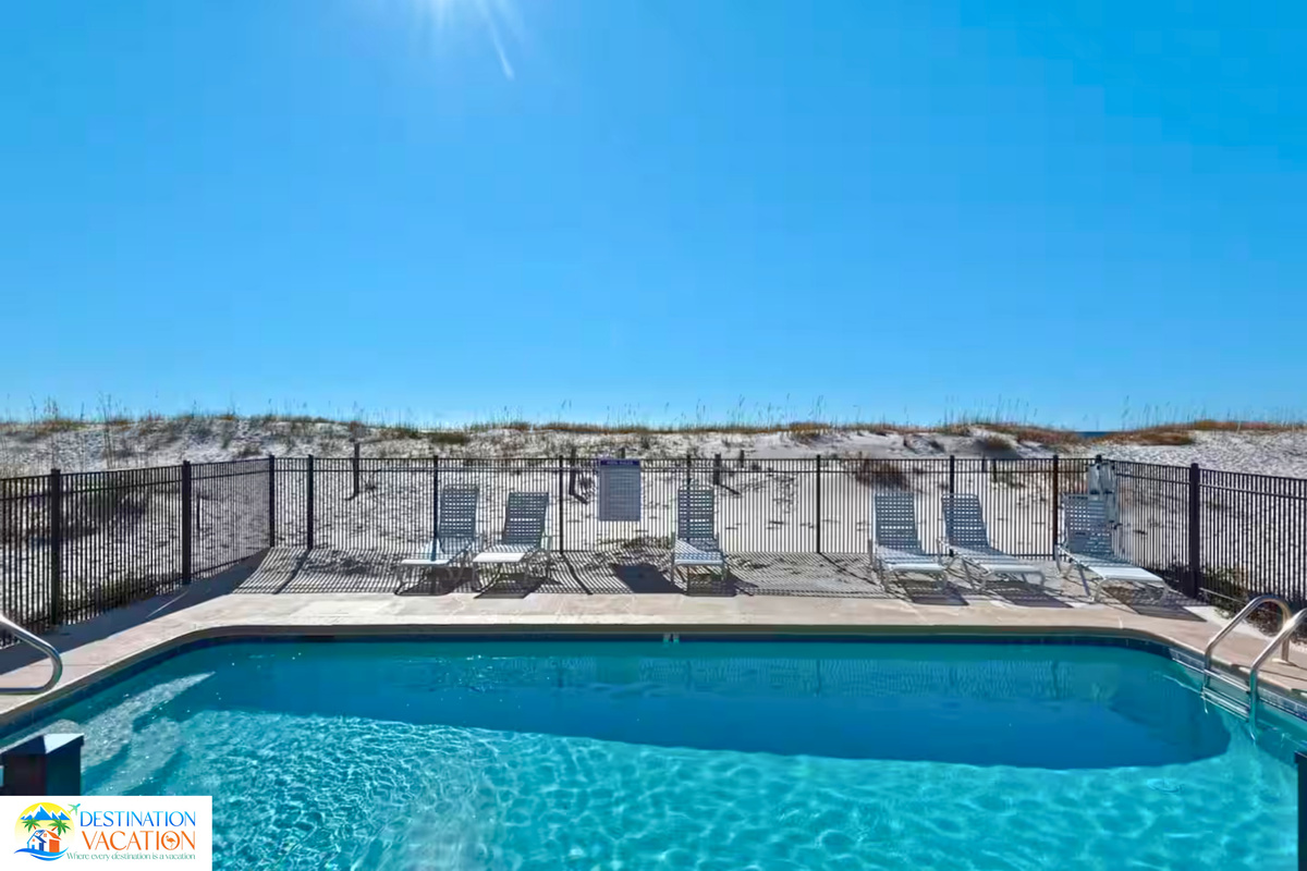 Poolside relaxation meets endless Gulf views.