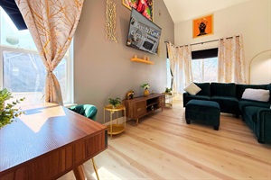 Spacious Living Area – Kick back and relax in our inviting living space, complete with plush seating, a Smart TV, and plenty of room for the whole group!