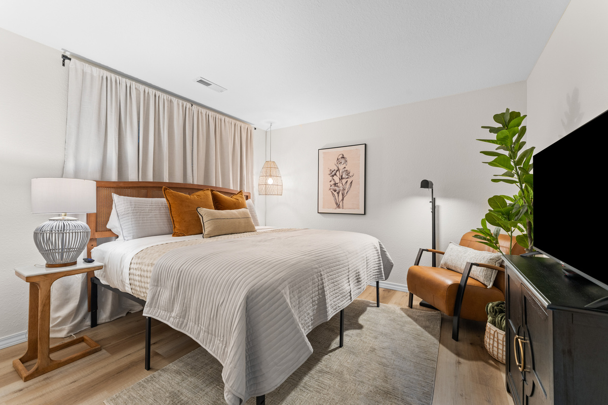 The second private bedroom also has a king bed, room-darkening curtains, and a 43-inch Roku TV with cable.