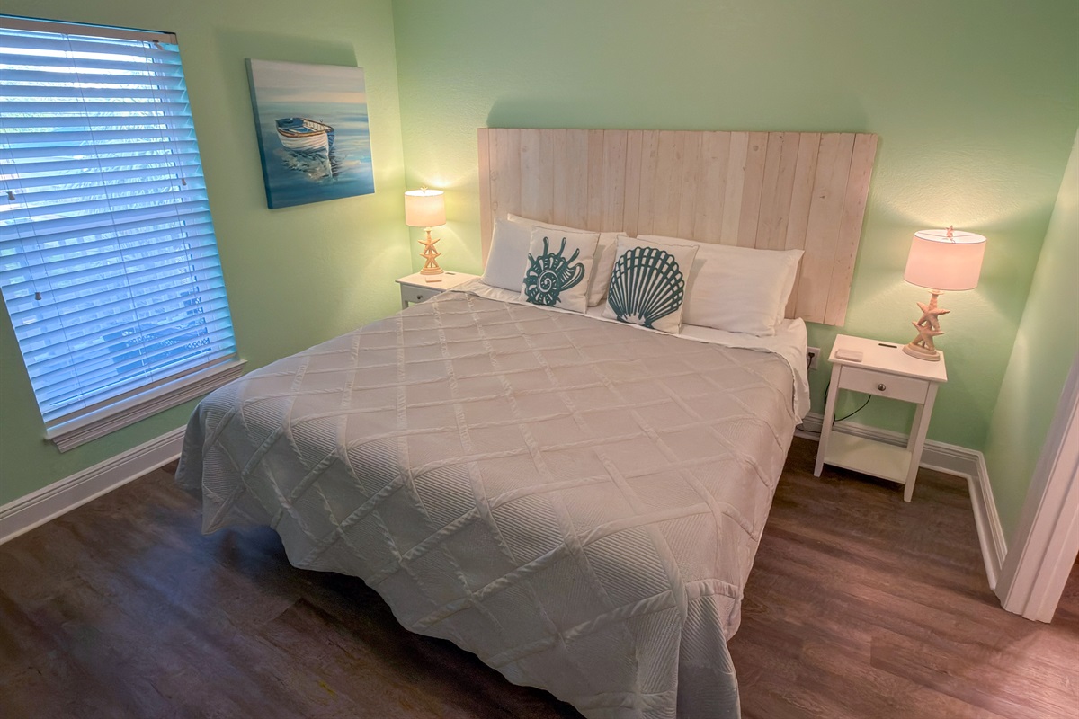 Second Floor Bedroom 6 captures the feeling of a quiet beach cottage with plush textures, coastal décor, and warm seaside character throughout.
