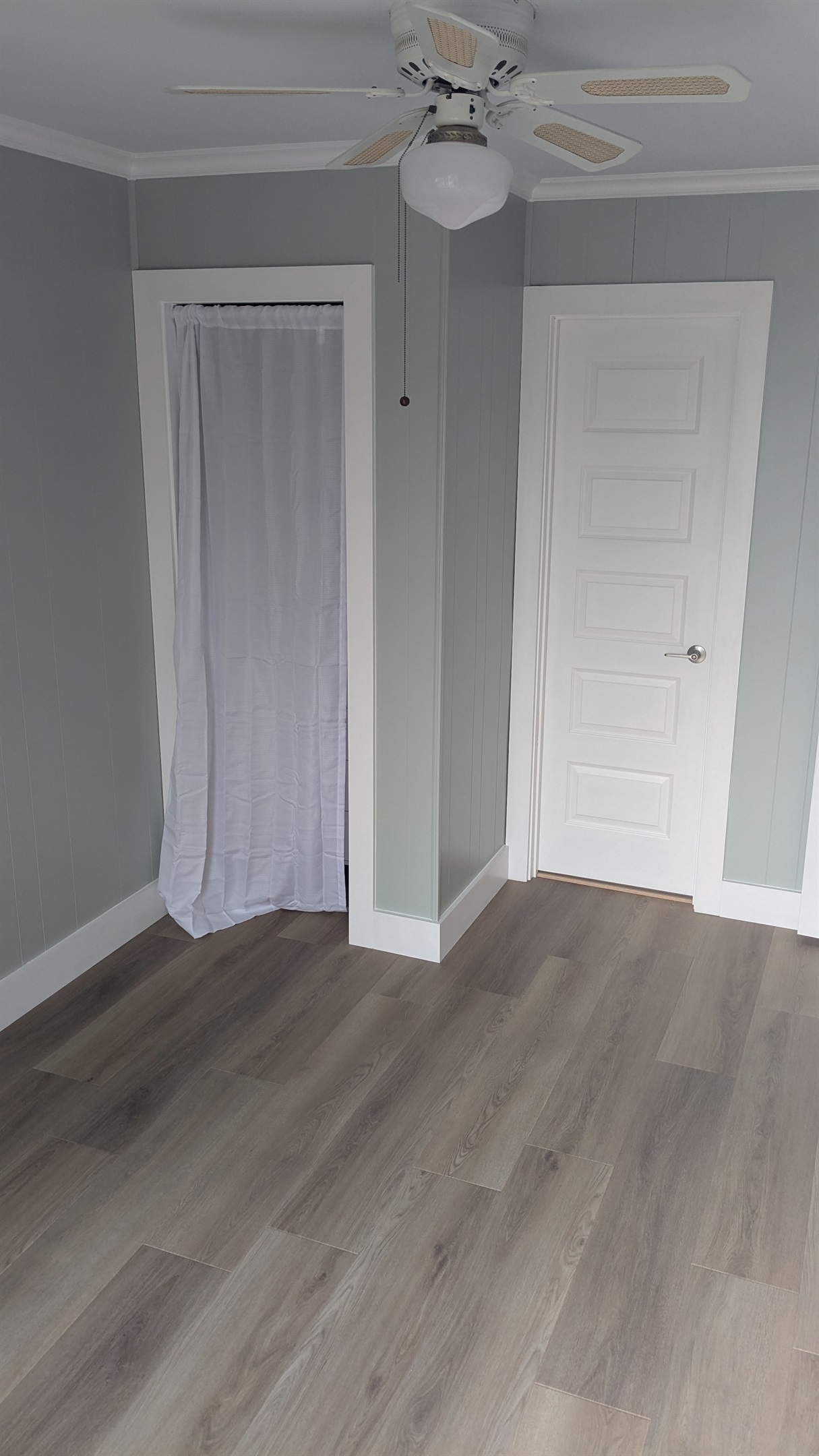 Bedroom also has a small closet for hanging clothes and storing items.