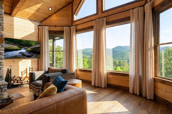 Relax in this sunny lounge area, where comfort meets nature with beautiful mountain views all around.