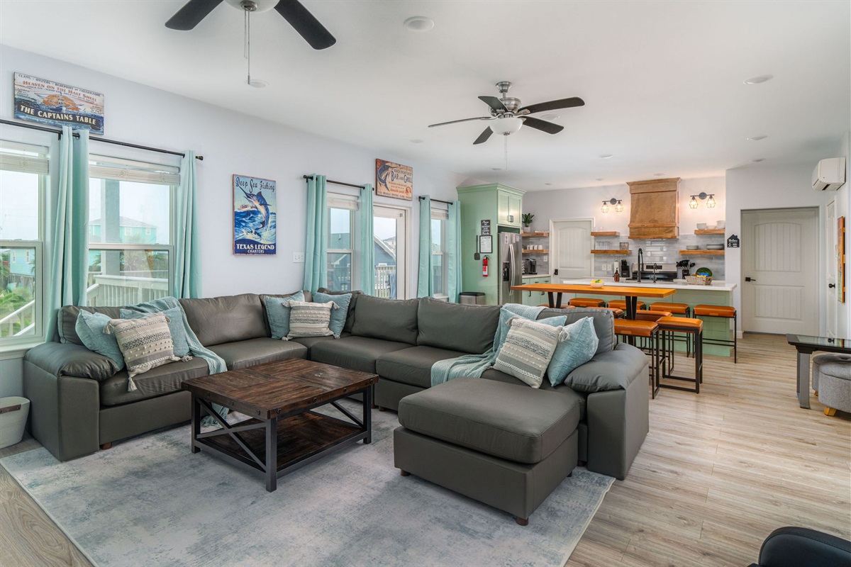 Open-concept living + kitchen so the whole group hangs together. Oversized sectional, wide sight lines, room to breathe