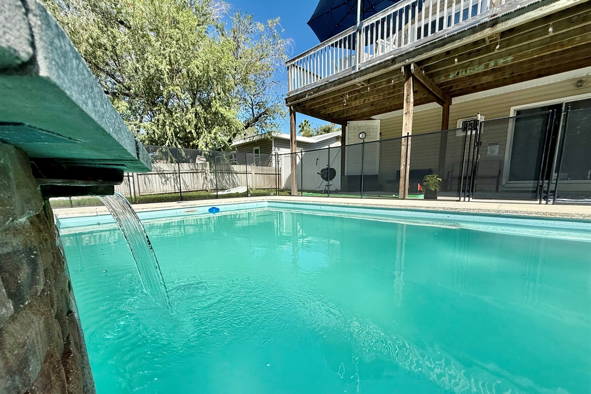 Fenced pool area for peace of mind while kids splash and play.
