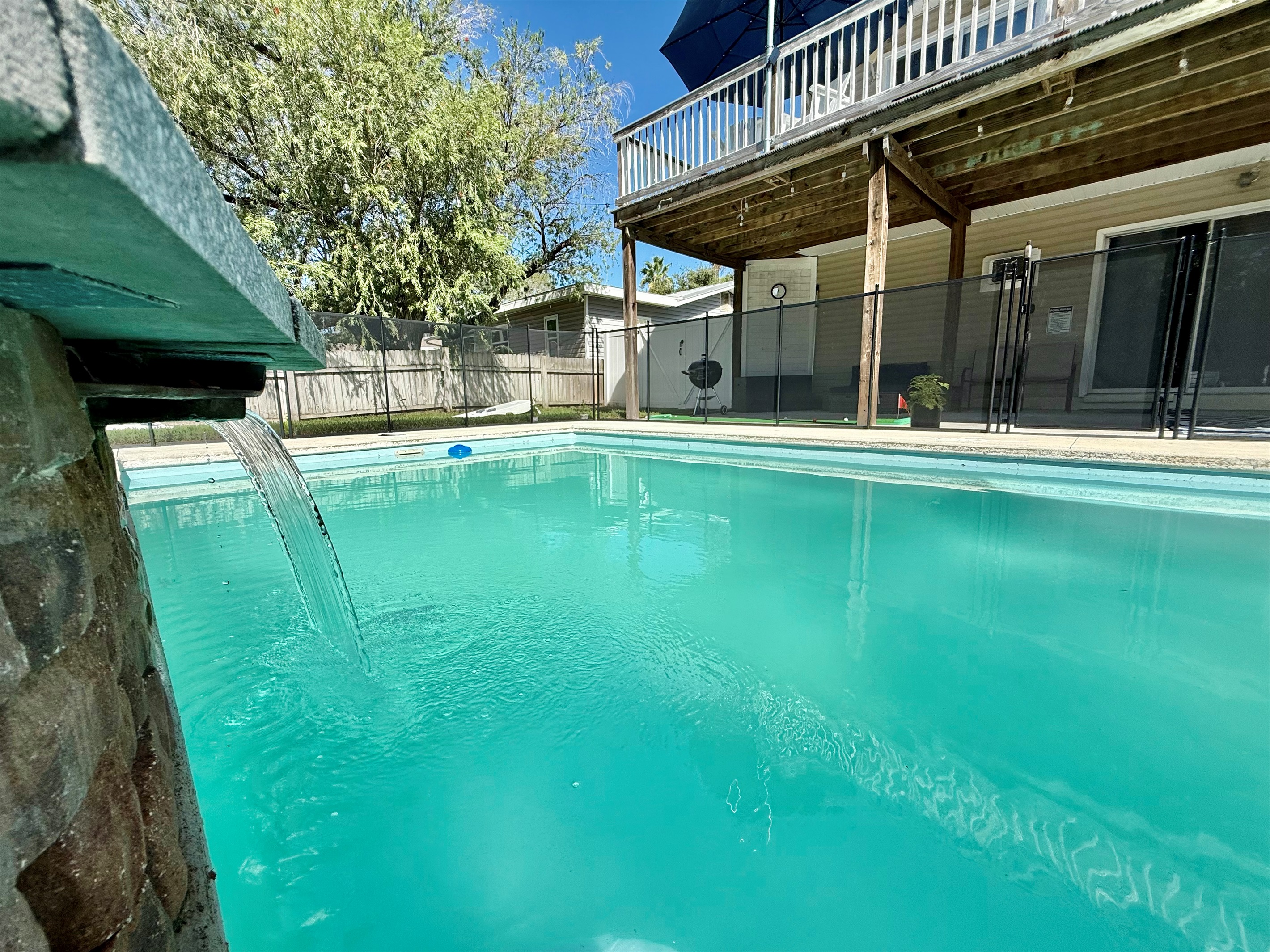 Fenced pool area for peace of mind while kids splash and play.
