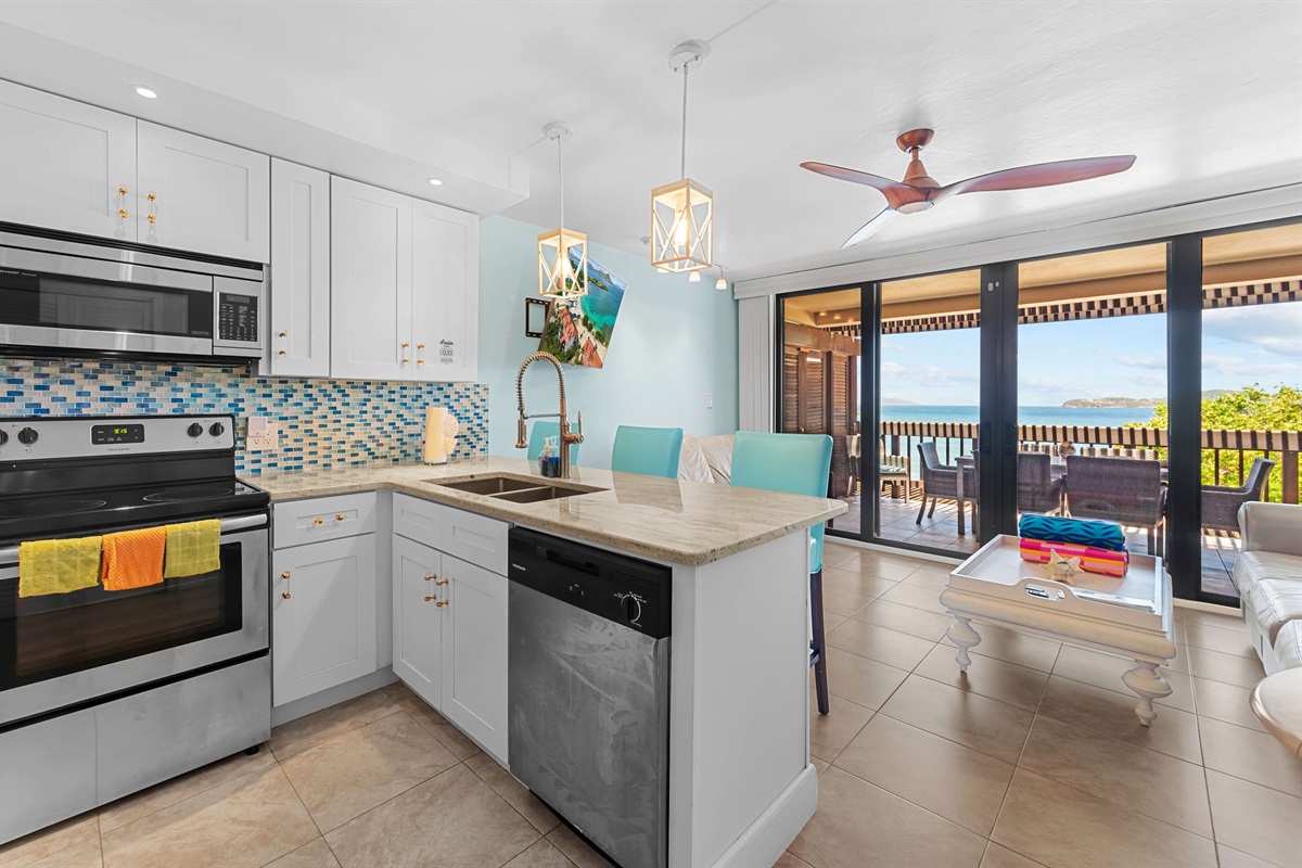 Well appointed kitchen opens to the living room and gorgeous views