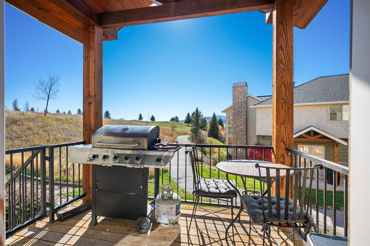Upper level covered deck complete with outdoor gas grill for your cooking pleasure.