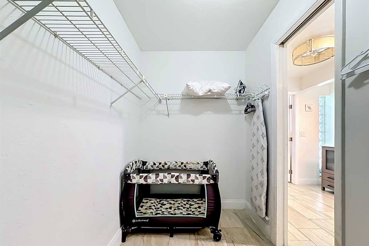 Walk-in closet, connected to the master bedroom. 