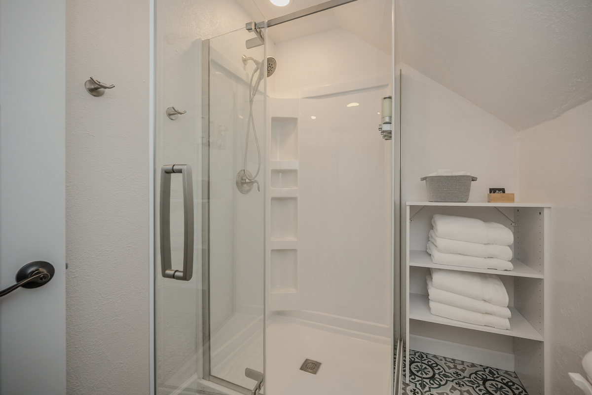 The beautiful shower has great water pressure.