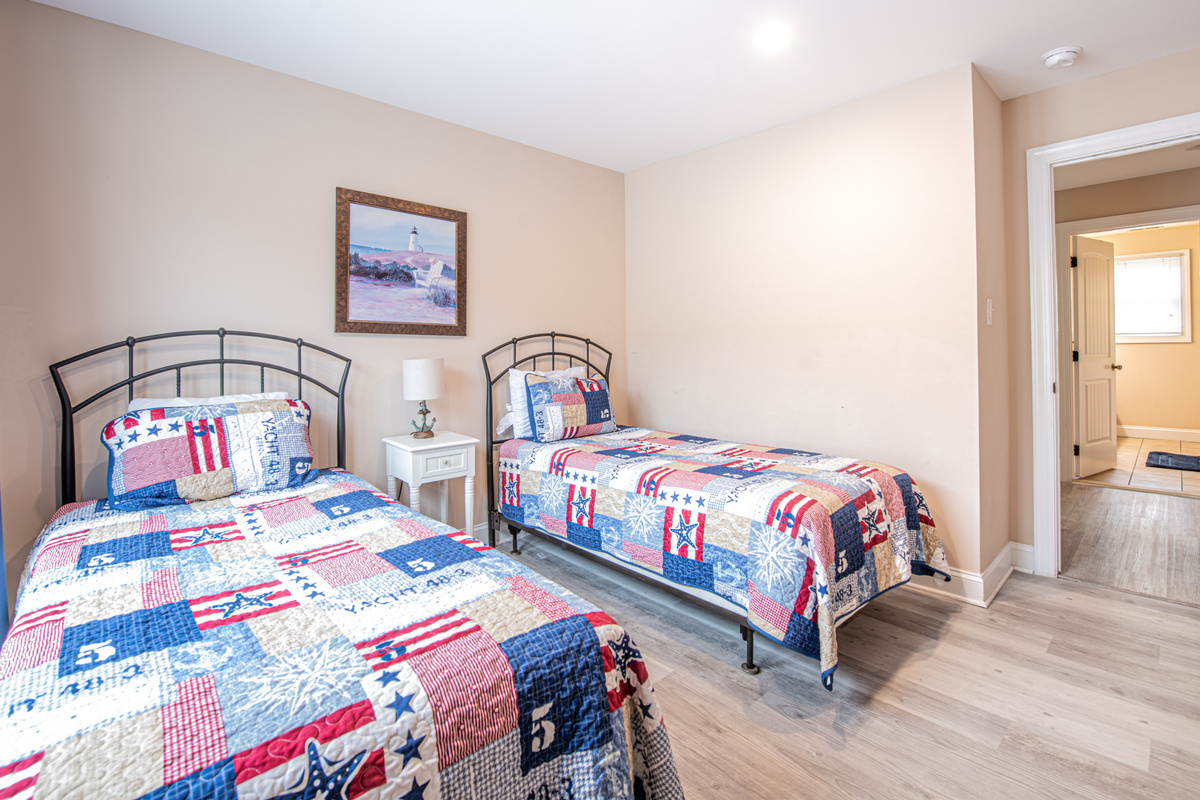 Two Twin Beds and Nautical Decor