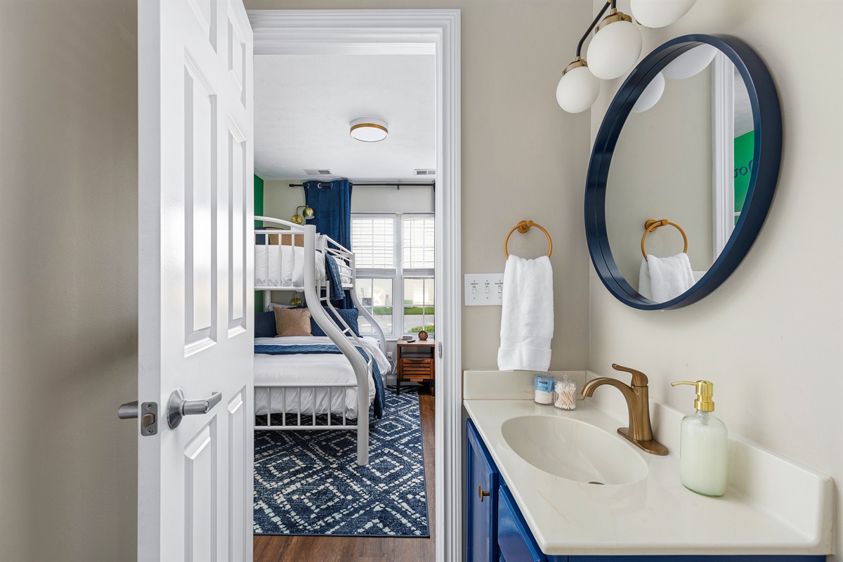 Full bathroom with shower attached to 1st floor bunk room