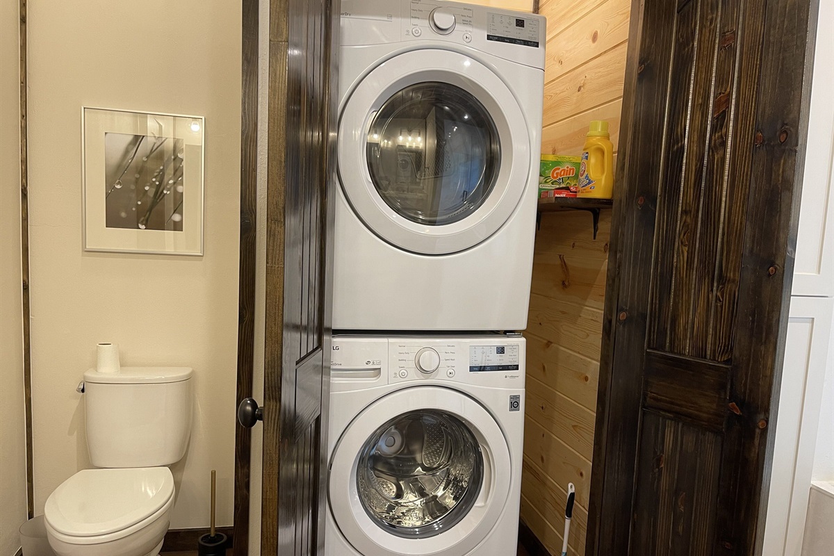 The master bath also houses the washer and dryer, which is there for you to use so you can go home with a suitcase full of clean clothes!