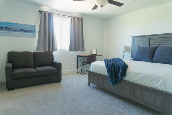 Bathroom 1: Primary with king bed, desk, twin pullout sofa, ensuit bathroom and walkin closet