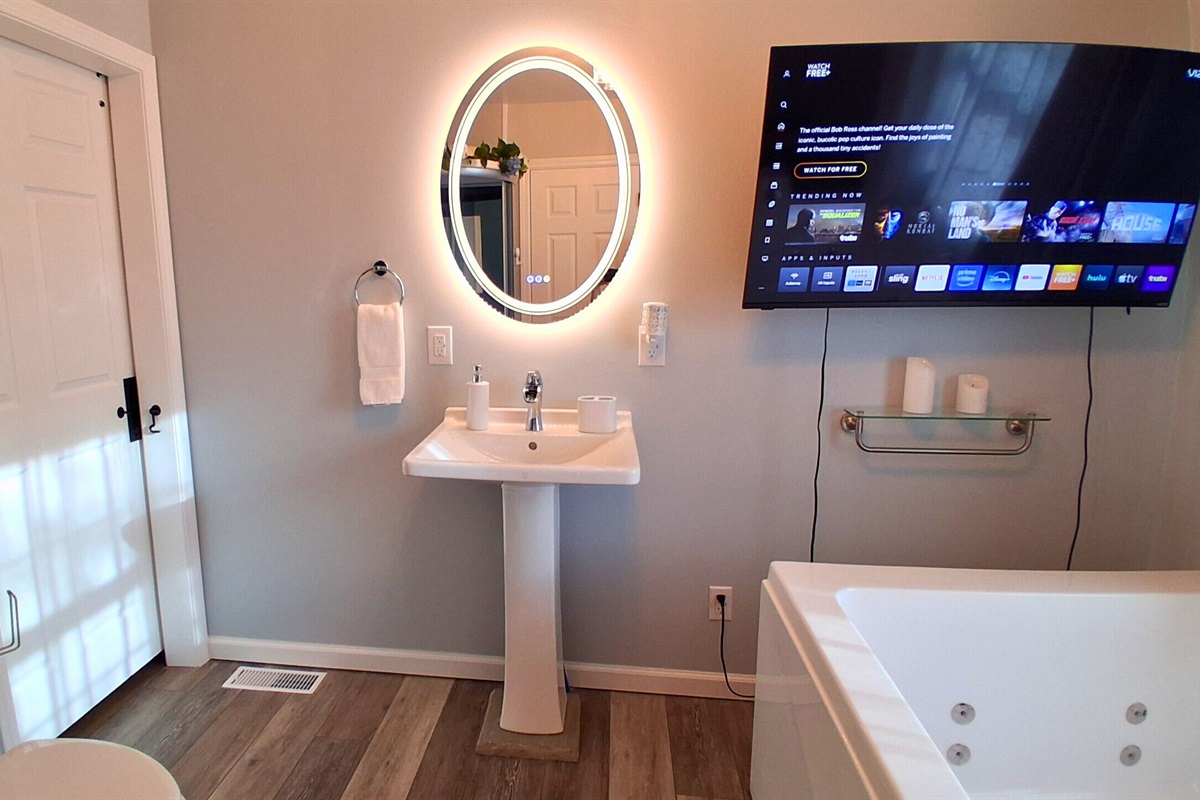 Enjoy a 42" backlit TV, perfectly positioned for viewing from the jetted tub and a fog-free mirror. Whether you're streaming your favorite shows or unwinding with someone special, relax together in the comfort of warm, swirling jets and ambient lighting.