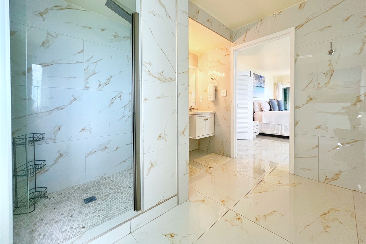 Bathroom featuring modern design and soft ambient lighting.