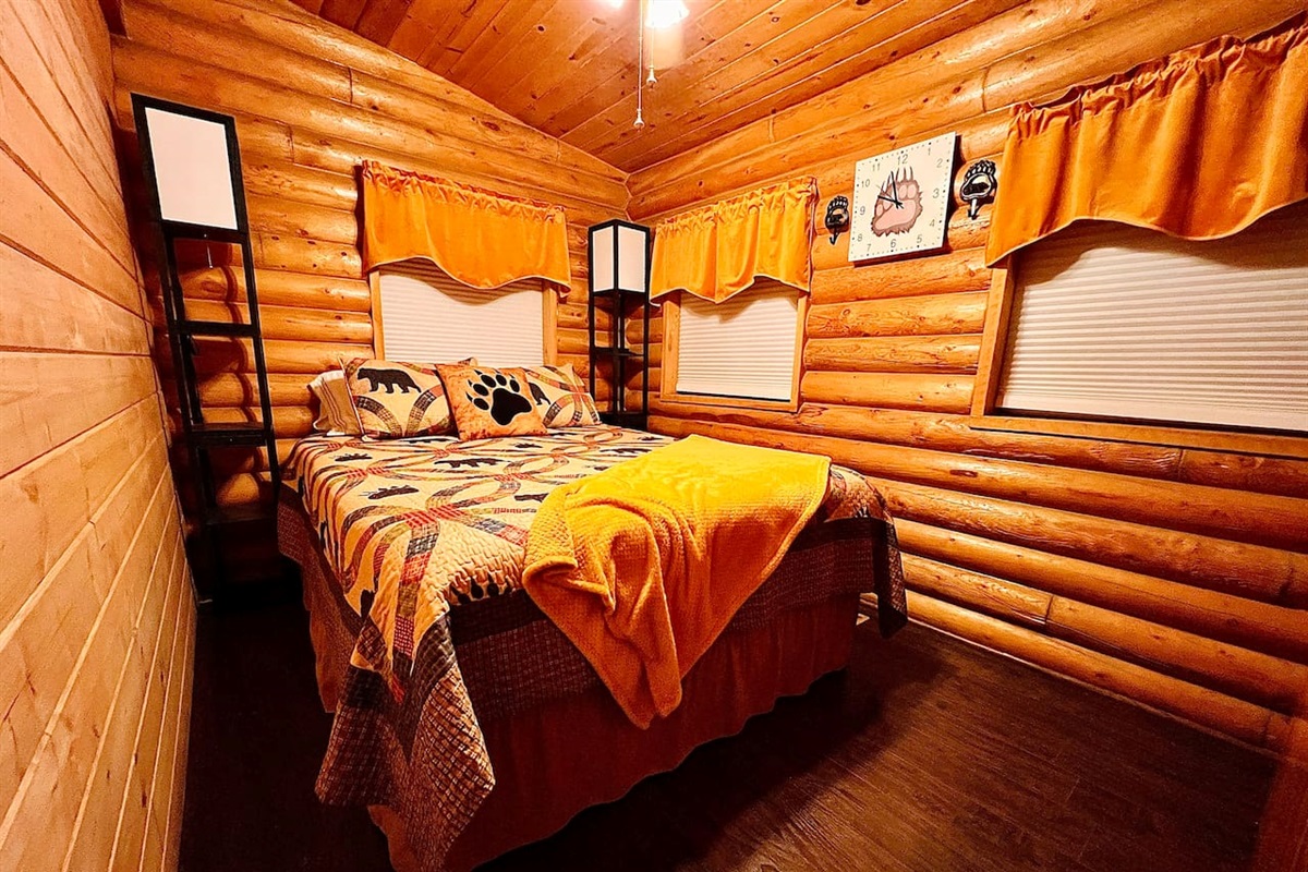 Paw's Place features a queen bed and is located on the main floor.
