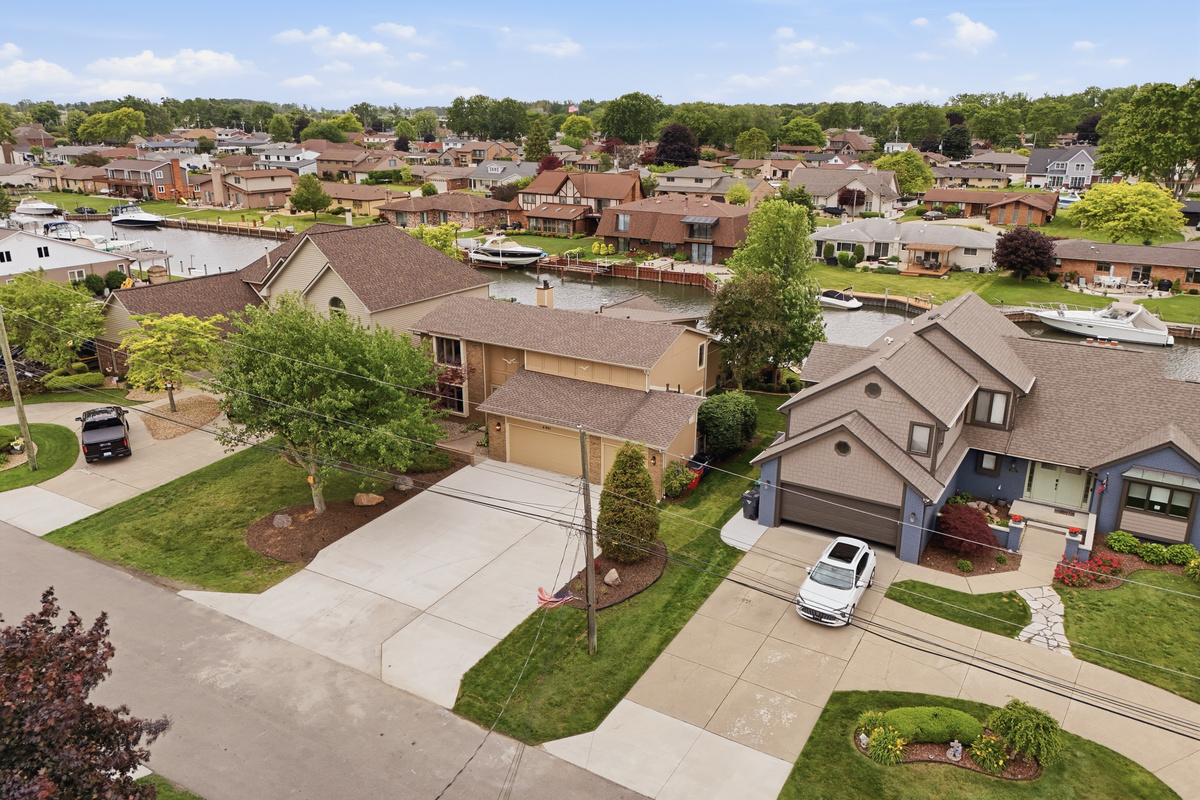 Quiet suburban retreat on a well-maintained street with a clean, modern exterior, wide driveway, and peaceful neighbourhood setting ideal for families or extended stays seeking comfort and convenience near local amenities.
