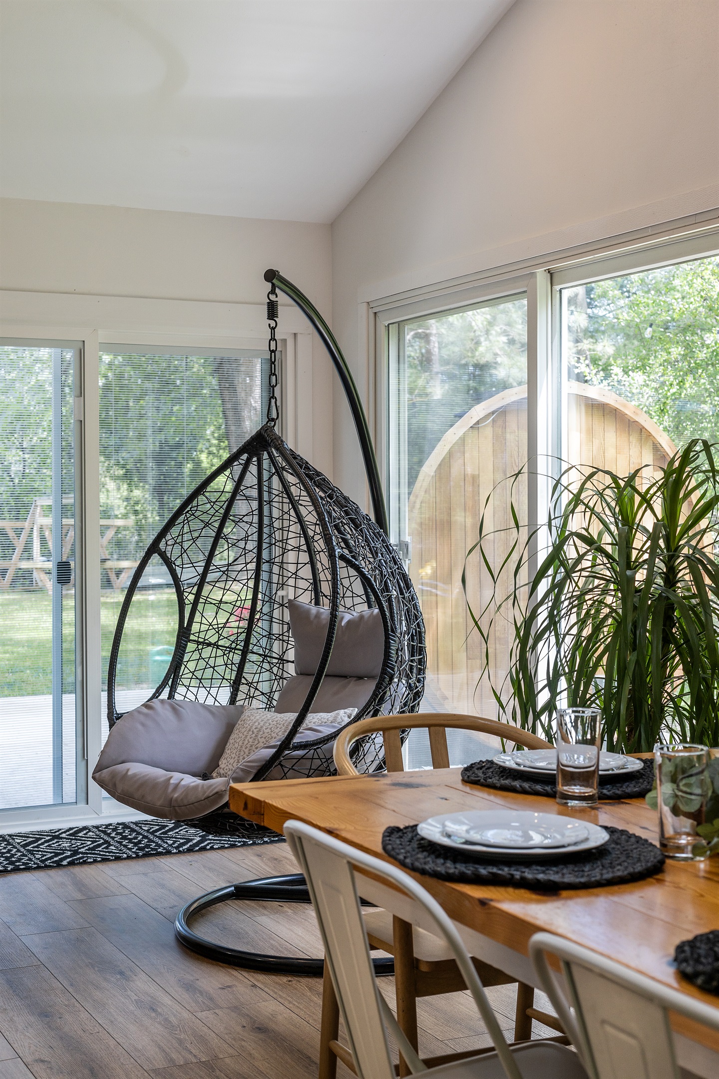 Swing, relax, and soak in the tranquility of lakeside living.