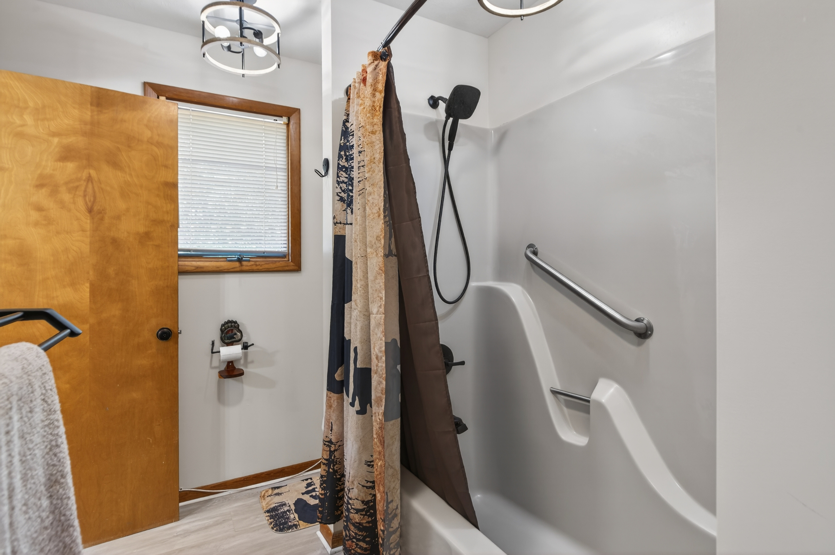 Bathroom Oasis: Enjoy modern fixtures and natural light in this refreshing bath retreat!