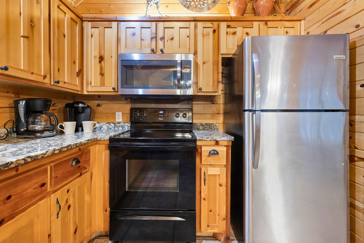 Full kitchen with stainless steel appliances—cook with ease.