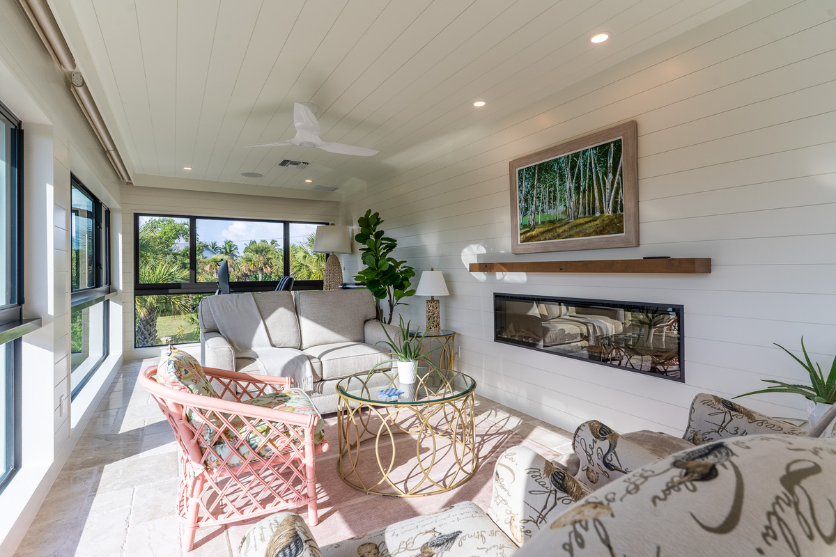 Sitting Area with Fireplace and Lagoon Views