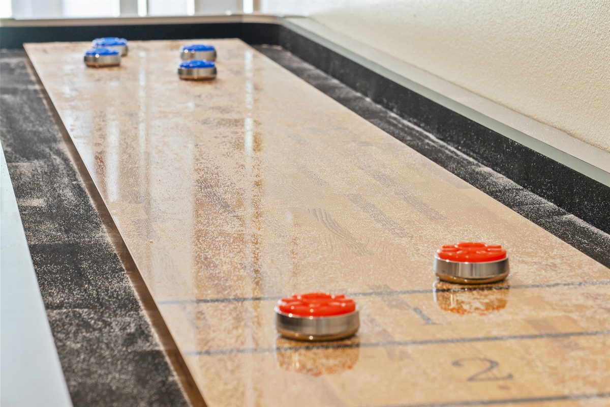 Compete in shuffleboard!