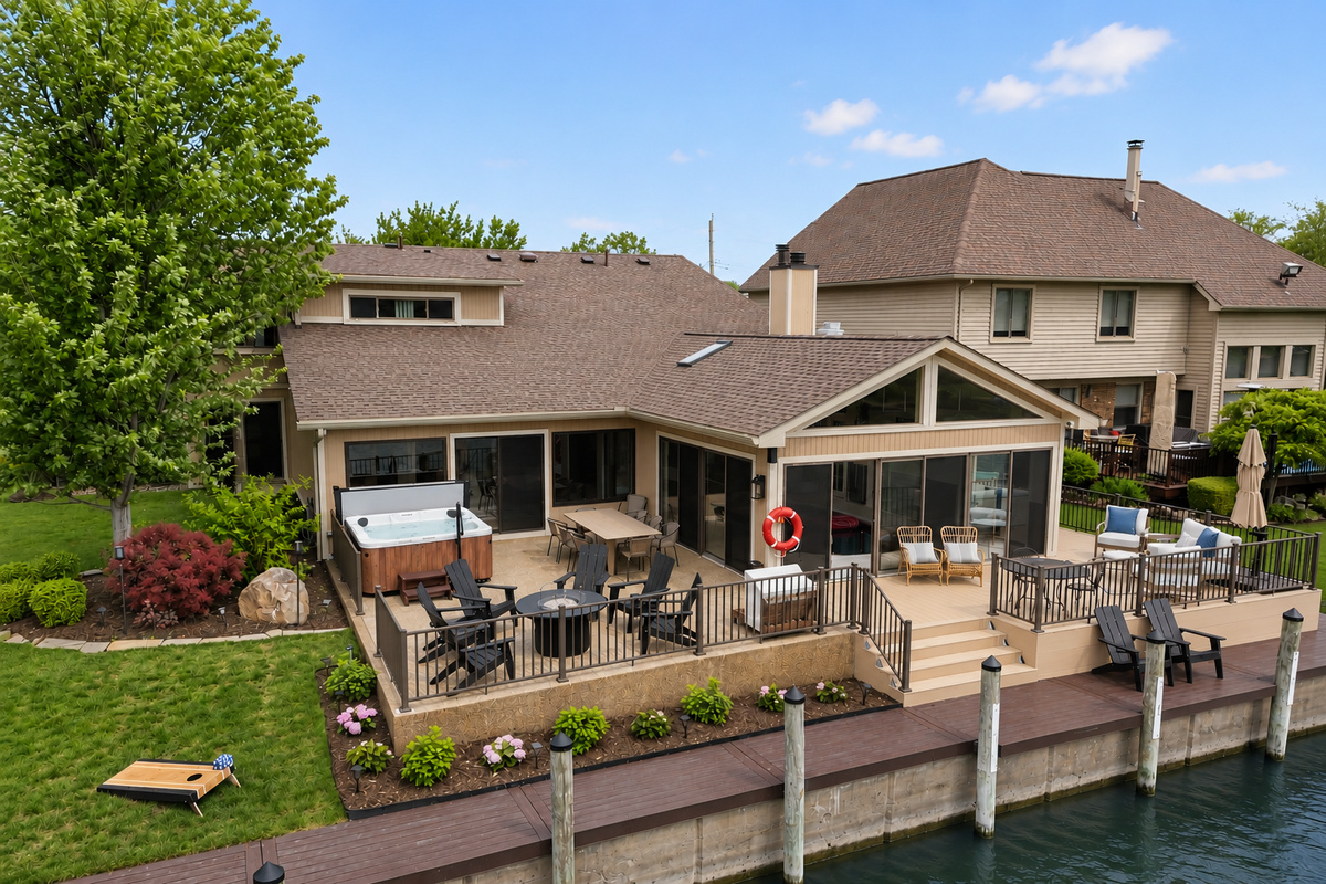 Waterfront home with private dock, spacious deck, and peaceful canal views perfect for relaxing and entertaining.
