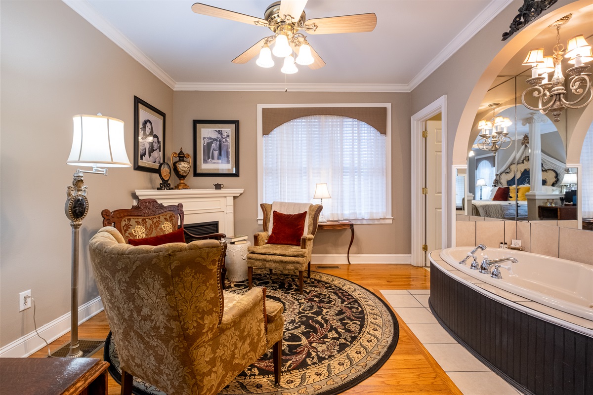 Relaxing lounge space adjacent to the spa bath, designed for comfort and retreat.