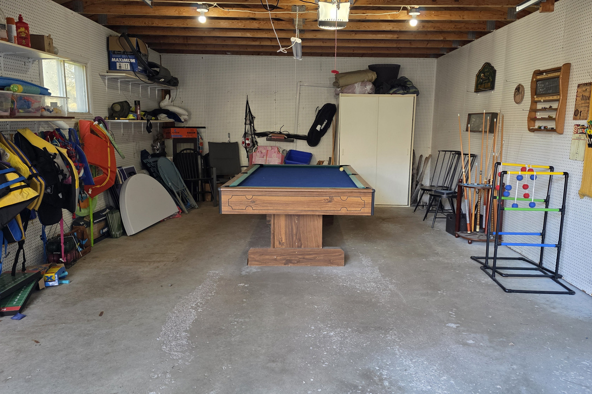 Game Room: Darts, Pool, life jackets, outdoor games (badminton, Boche ball, lawn darts, cornhole, croquet, and more!). Not Temperature Controlled. 